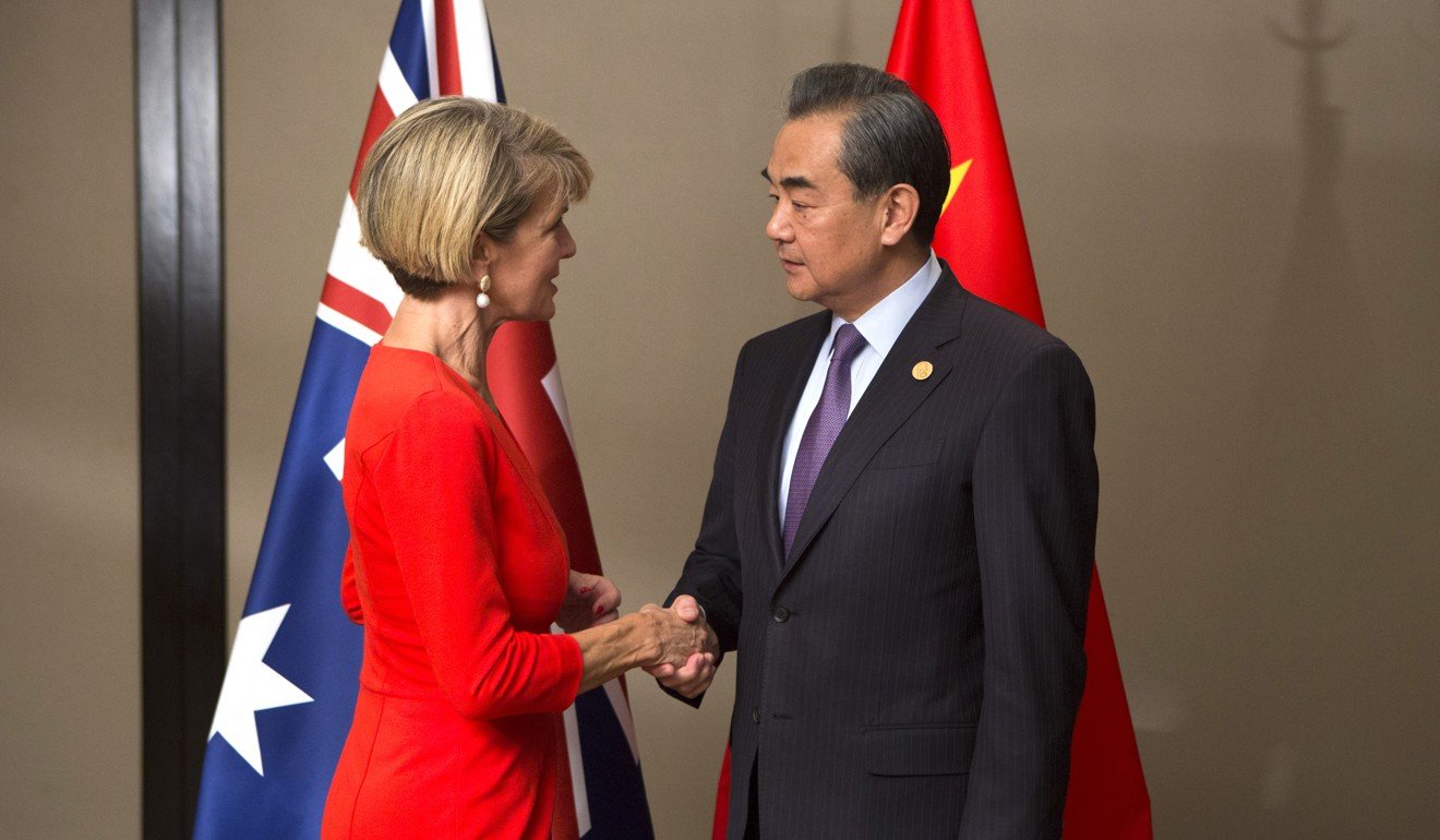 Australian Foreign Minister Julie Bishop with Chinese counterpart Wang Yi. Photo: Xinhua