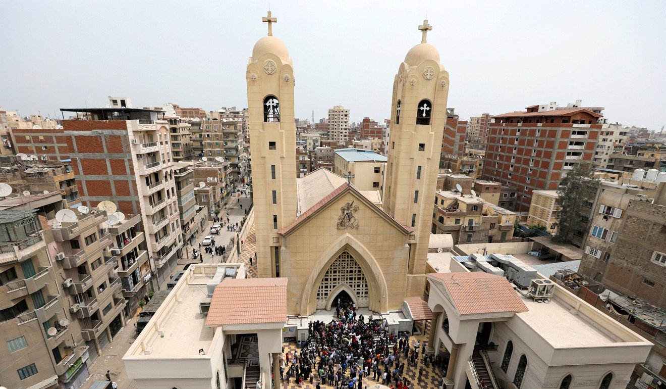 Egyptians gather by a Coptic church that was bombed in April 2017. Photo: Reuters
