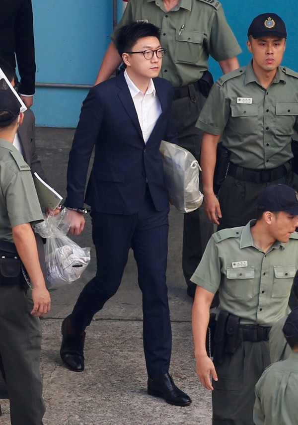 Pro-independence activist Edward Leung leaves a detention centre en route to his sentencing hearing on June 11. Picture: Reuters