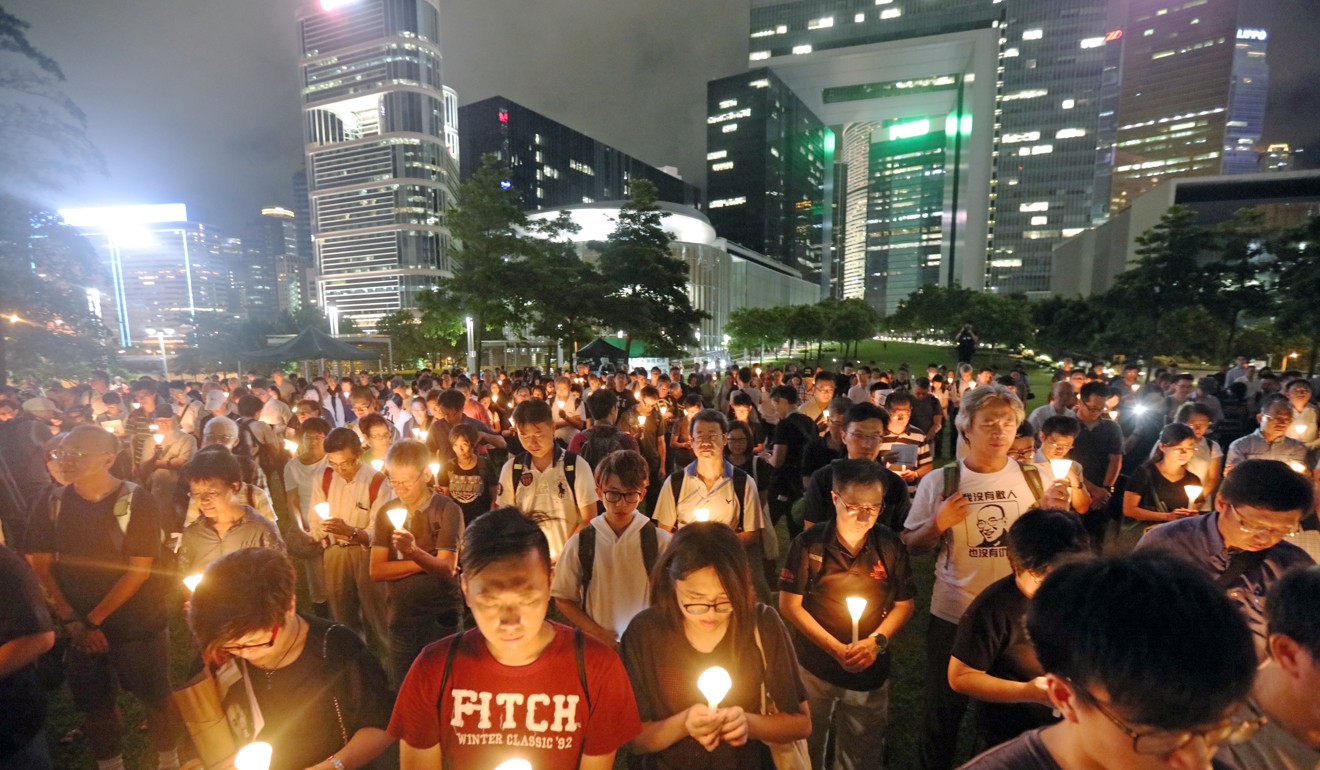 A memorial gathering at the Hong Kong government headquarters marks the one-year anniversary of Liu Xiaobo’s death. Picture: Felix Wong