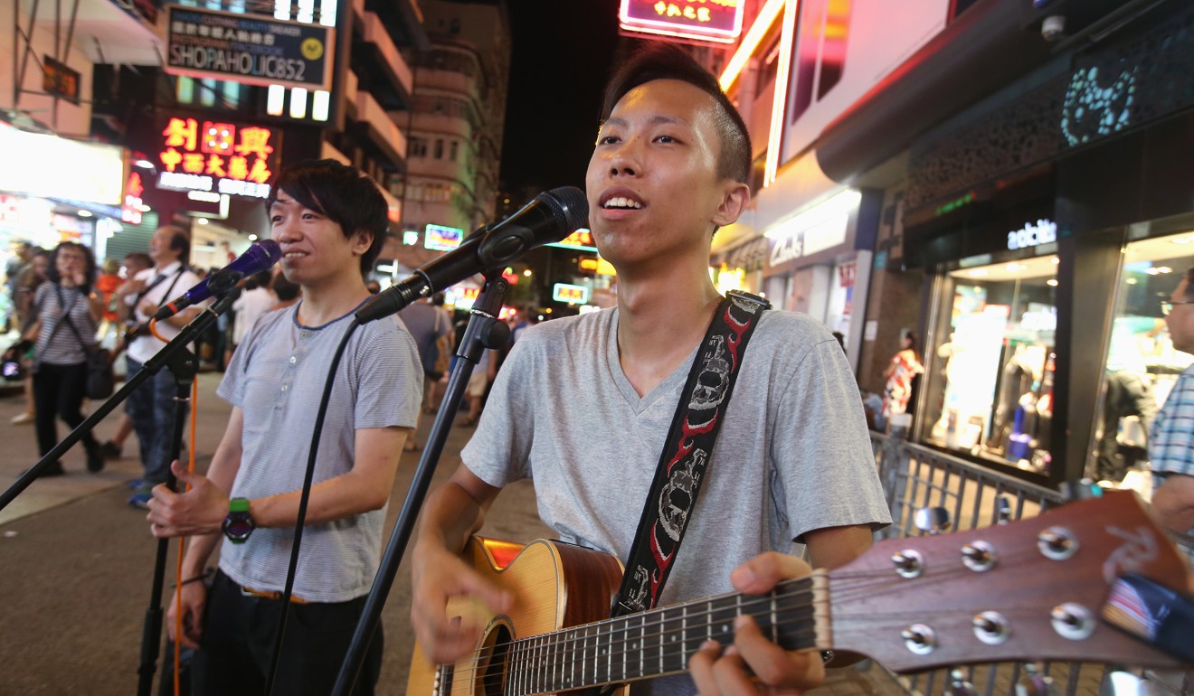Some of the performers on the pedestrian zone on Sunday night. Photo: David Wong