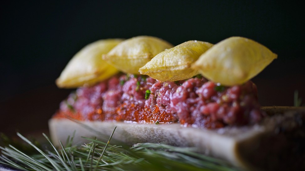 Grilled bone marrow with steak tartare and soufflé potatoes served by chef Antonio Romero of Suculent restaurant, in Barcelona, who will join Hong Kong’s La Rambla by Catalunya for two nights in August.