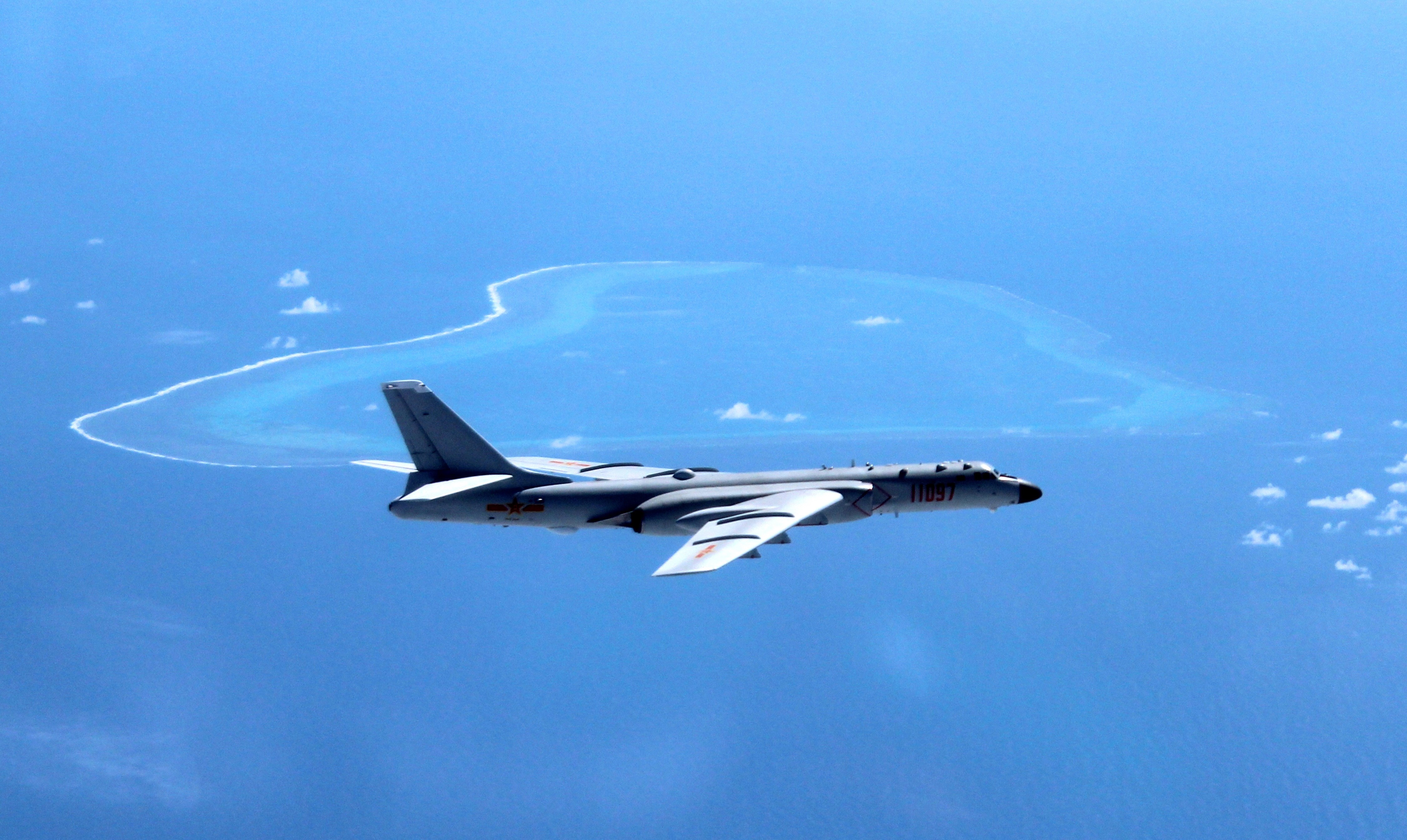 A Chinese H-6K bomber patrols the islands and reefs in the South China Sea. China and the Association of Southeast Asian Nations have agreed on a draft code of conduct that will lay the foundation for negotiations over the disputed South China Sea. Photo: Xinhua via AP