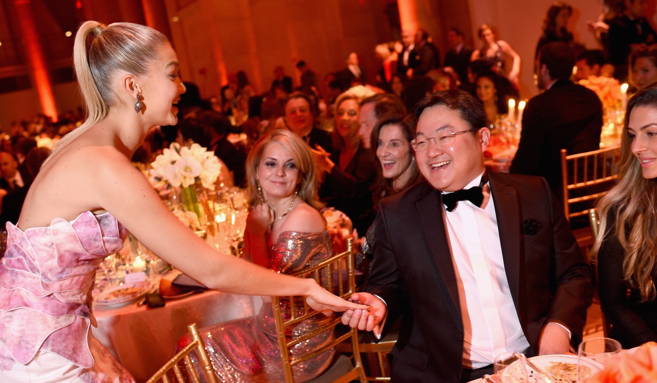 Malaysian businessman Jho Low with Gigi Hadid at a ball in New York in 2014. Photo: AFP