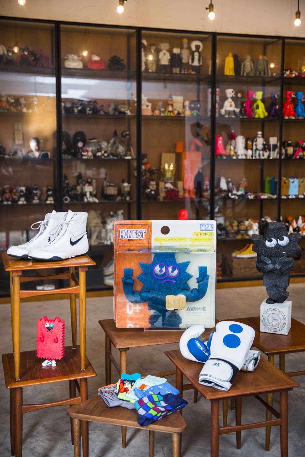 Boxing shoes by Nike Machomai, and boxing gloves by Colette x Body Cross are part of Lau’s eclectic collection. Photo: Michelle Wong