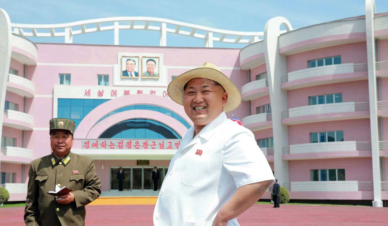 It’s not the first time Kim Jong-un has adopted the casual look complete with panama hat. This undated picture released by North Korea's official Korean Central News Agency shows a slimmer looking Kim inspecting a baby home and orphanage in Kangwon province. Photo: AFP/KCNA via KNS