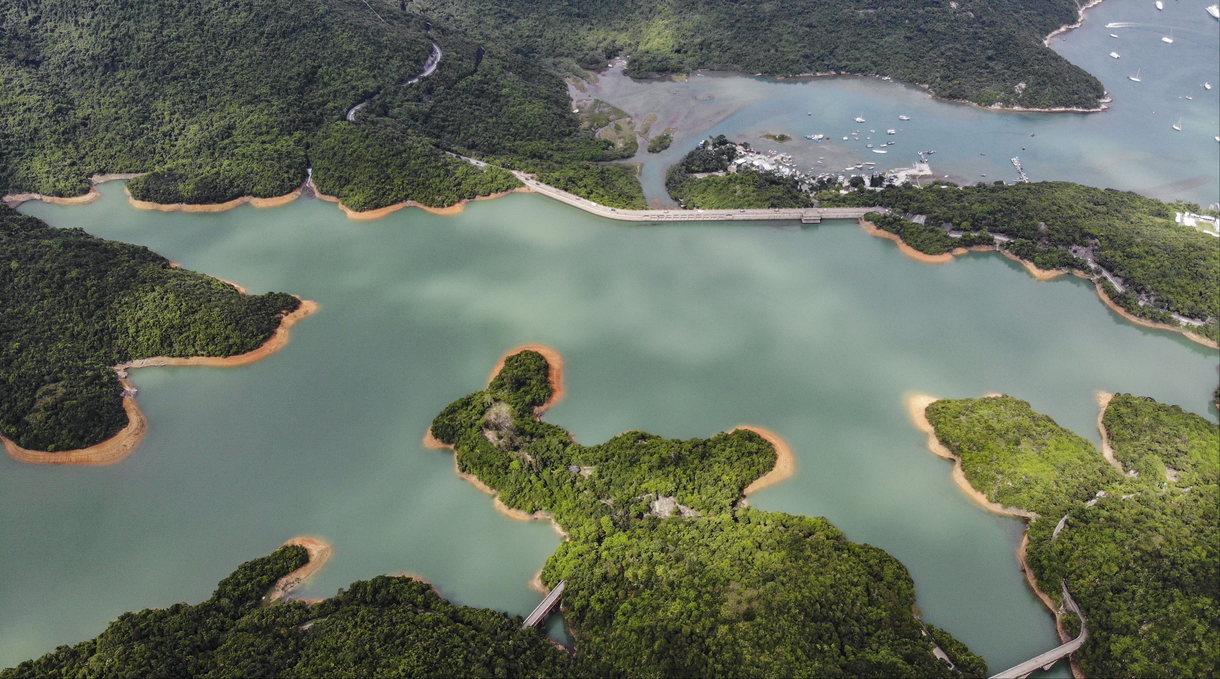 An aerial view of the Tai Tam Tuk Reservoir Dam in June, after a long heatwave in Hong Kong. Photo: Roy Issa