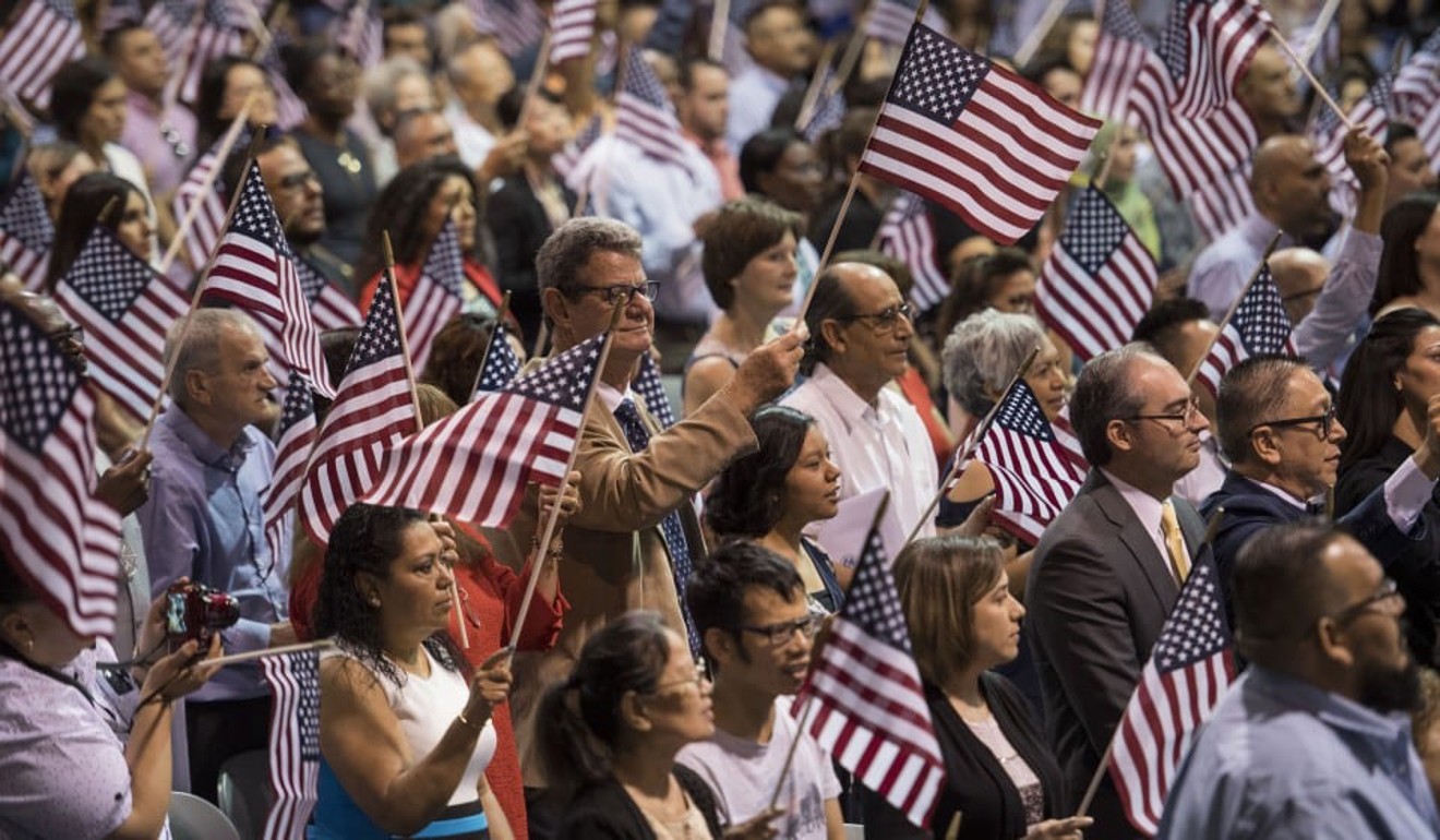 More than 220 people from more than 40 countries participate in a naturalisation ceremony in Phoenix, Arizona on July 4. Photo: Carolyn Van Houten/Washington Post