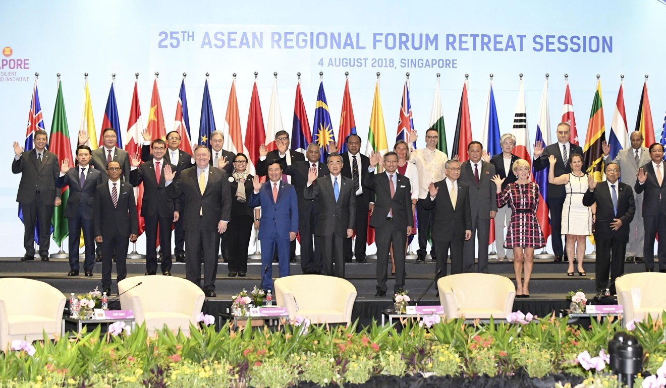 Foreign ministers pose for photos at the Asean Regional Forum meeting in Singapore on August 4. Photo: Kyodo