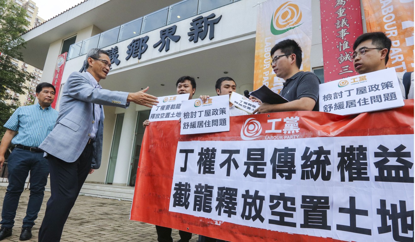 Task force chairman Stanley Wong (front left) meets activists. Photo: Felix Wong