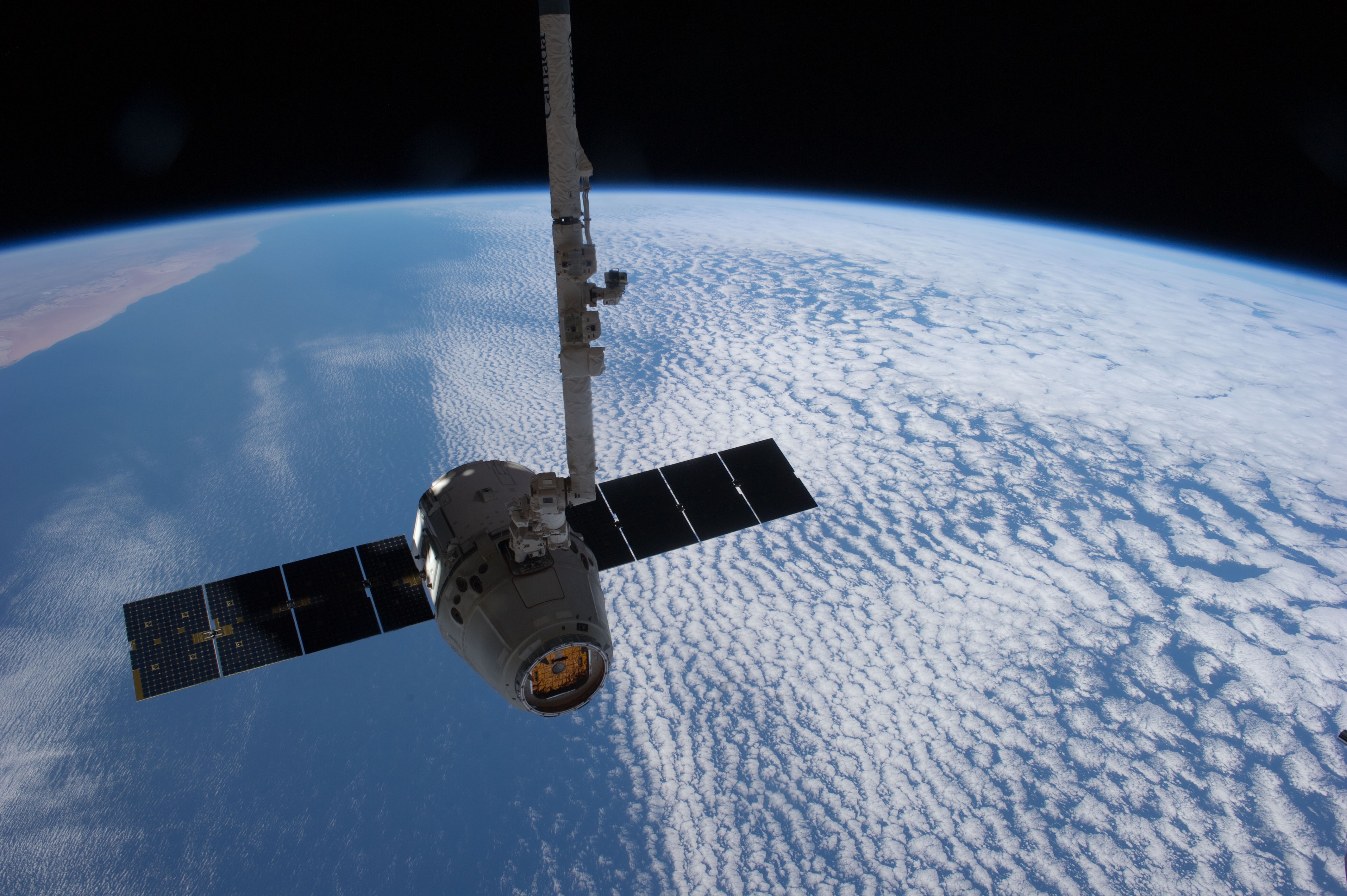 This image provided by Nasa shows the SpaceX Dragon cargo craft just prior to being released by the International Space Station's Canadarm2 robotic arm in 2012. Photo: AP/Nasa