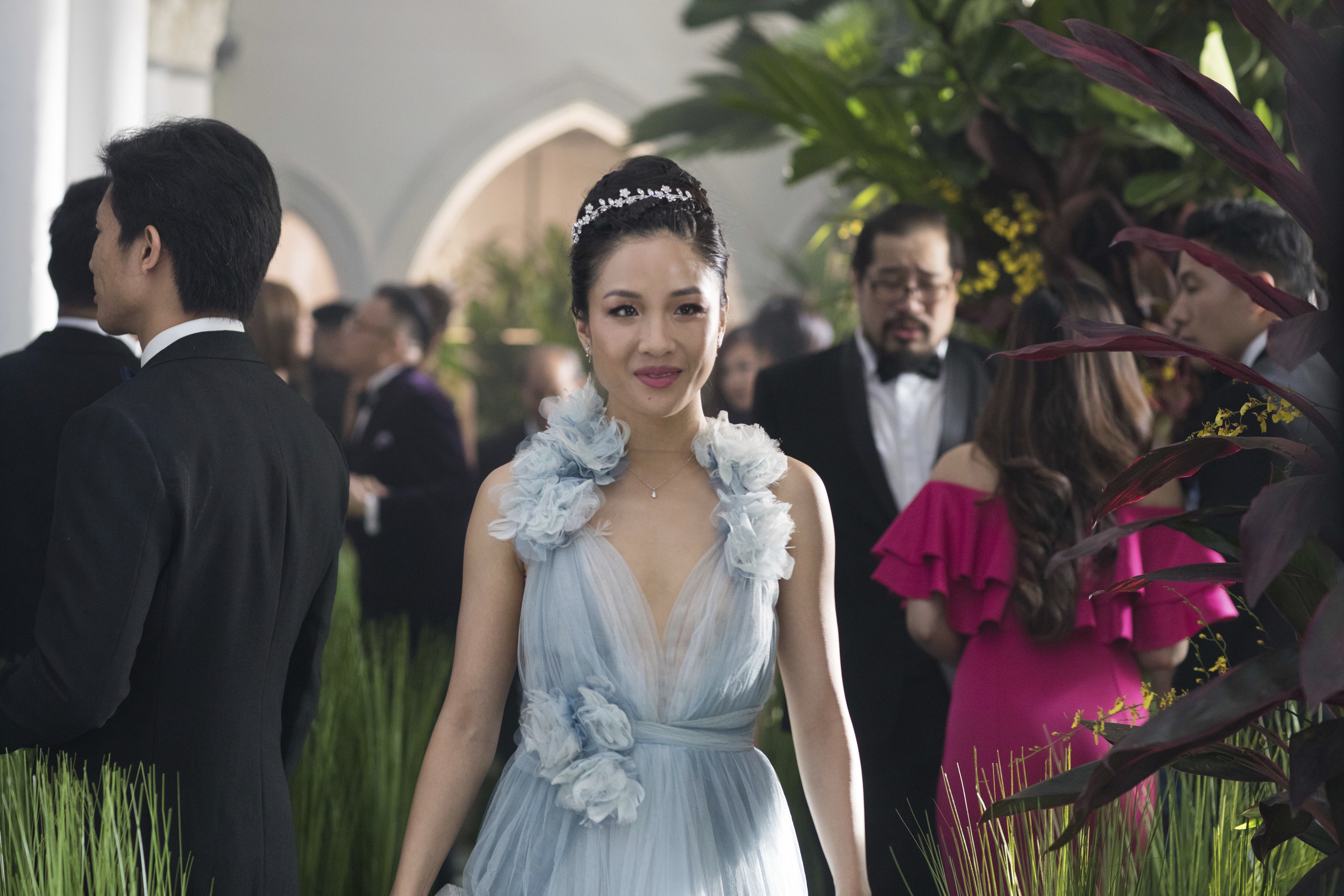 Crazy Rich Asians is about a young woman (Constance Wu) being initiated into Singapore high society. Photo: AP