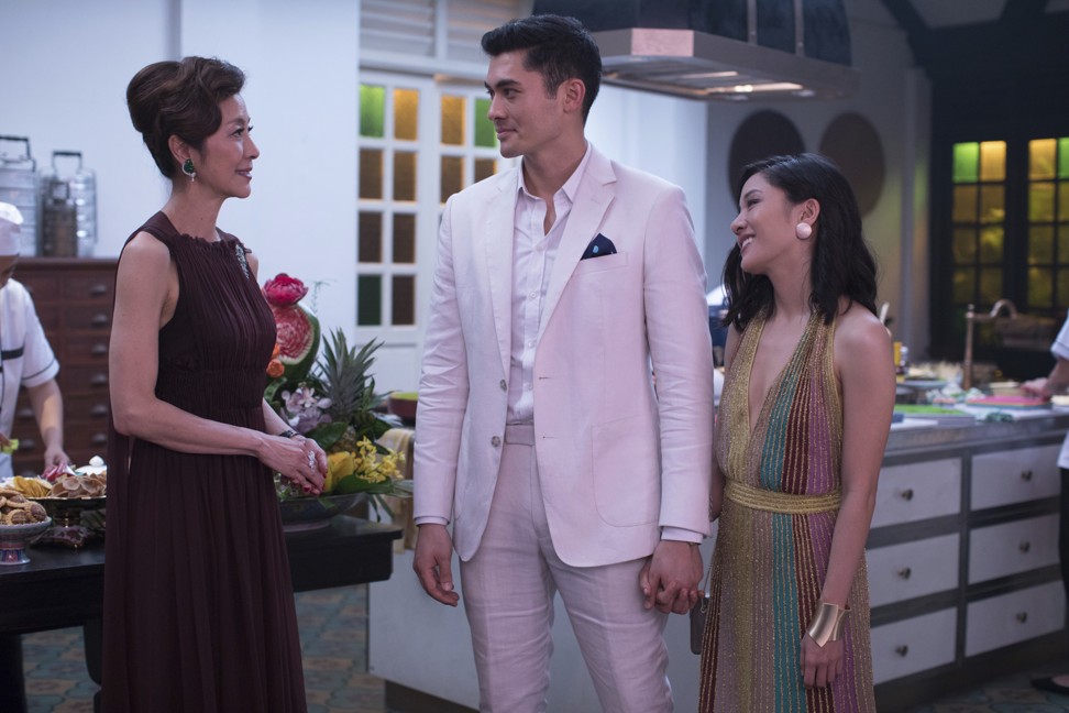 Michelle Yeoh (left), Henry Golding (centre) and Constance Wu in a scene from the romantic comedy-drama ‘Crazy Rich Asians’, which topped the weekend box offices in US and Canada when it was first released. Photo: Warner Bros. Entertainment/AP
