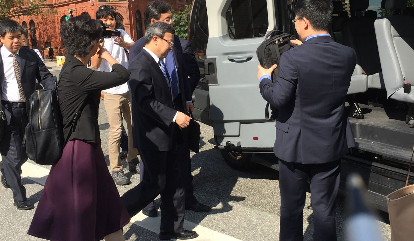 Vice-minister of commerce Wang Shouwen (centre) leave the building of the US Treasury after two days of unsuccessful talks with US representatives in Washington last week. Photo: AFP