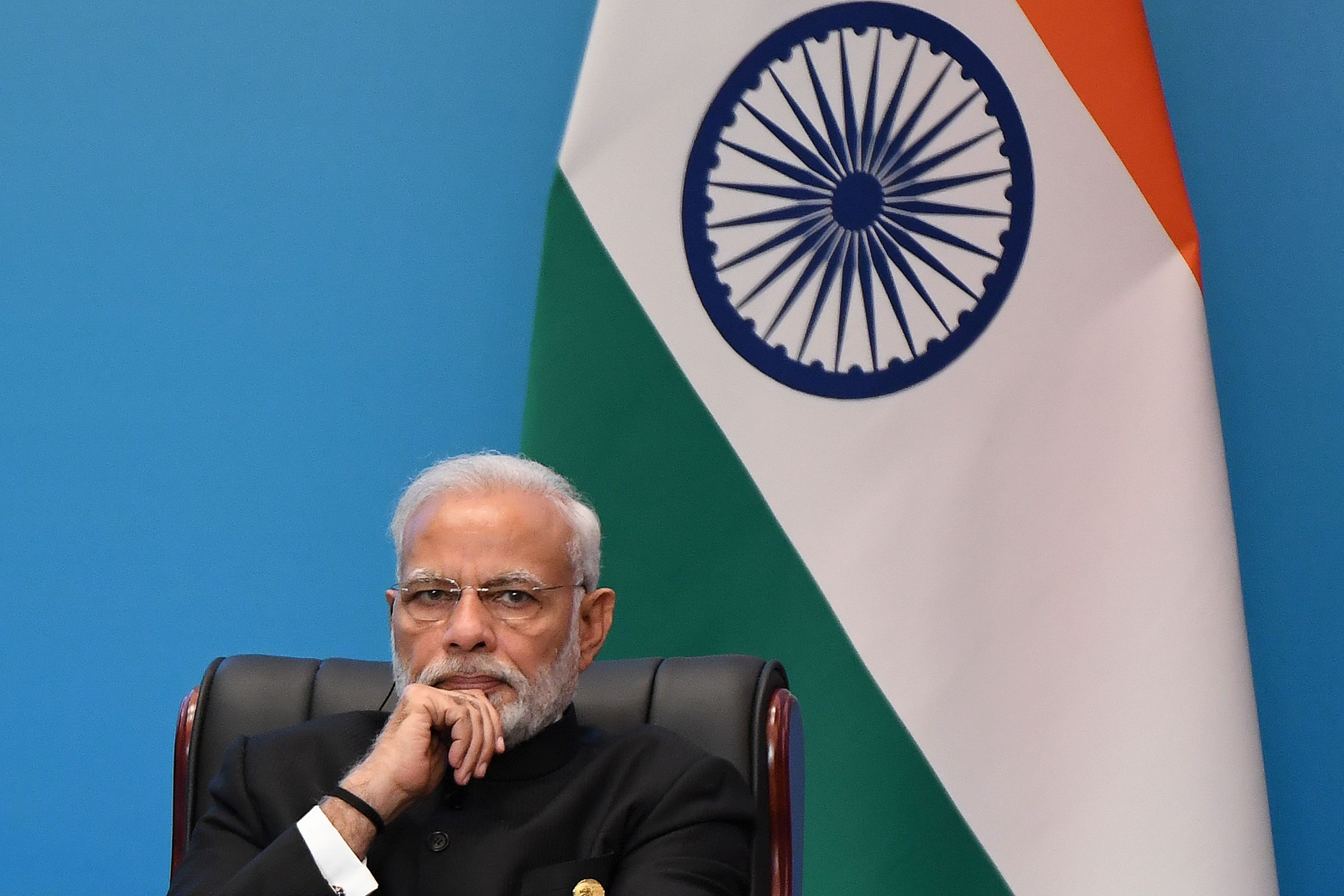 Indian Prime Minister Narendra Modi looks on as he attends a signing ceremony during the Shanghai Cooperation Organisation (SCO) Summit in Qingdao, China. His ruling government has come under fire for a crackdown on dissent following the arrest of key rights activists. Photo: AFP