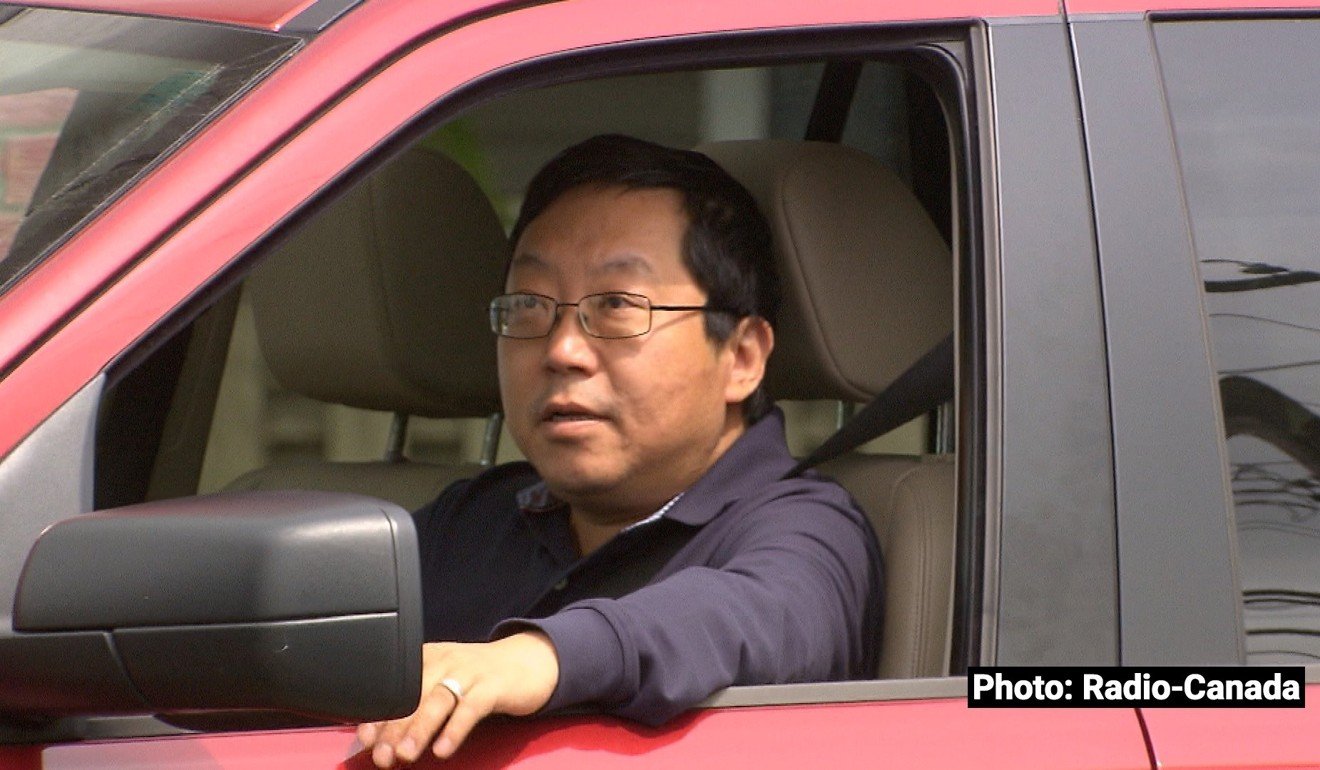 Former unlicensed immigration consultant Xun ‘Sunny’ Wang, is seen in a photo taken by Radio-Canada's investigative programme ‘Enquête’ as he was leaving his home in Richmond, British Columbia. Wang, who was freed from prison in late 2017, refused to answer Radio-Canada’s questions; nor did he respond to a written request for a response left by the ‘South China Morning Post’ at his home. Photo: Harold Dupuis/Radio-Canada