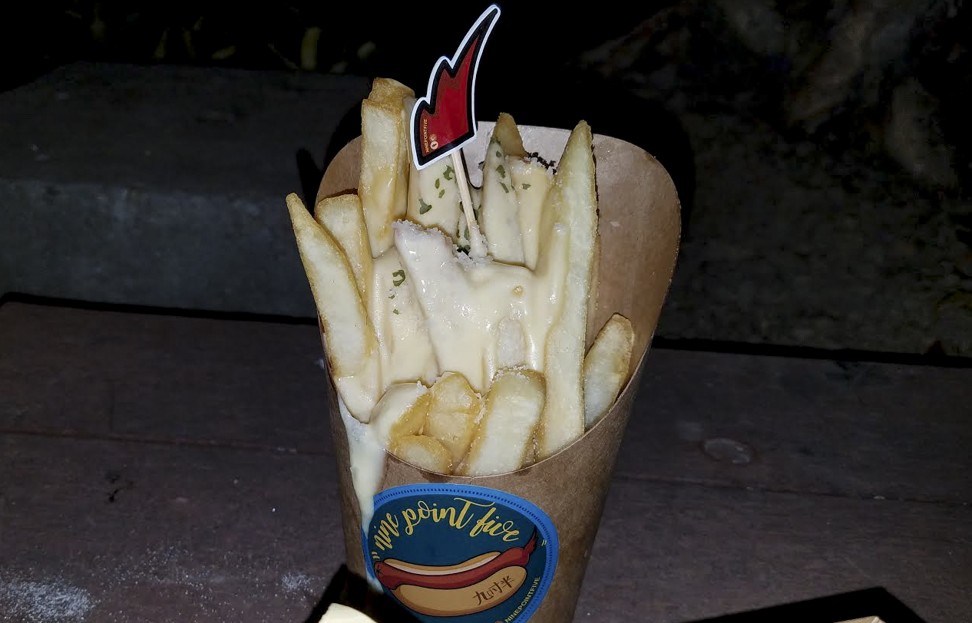 Nine Point Five’s fries with cheese sauce. Photo: SCMP