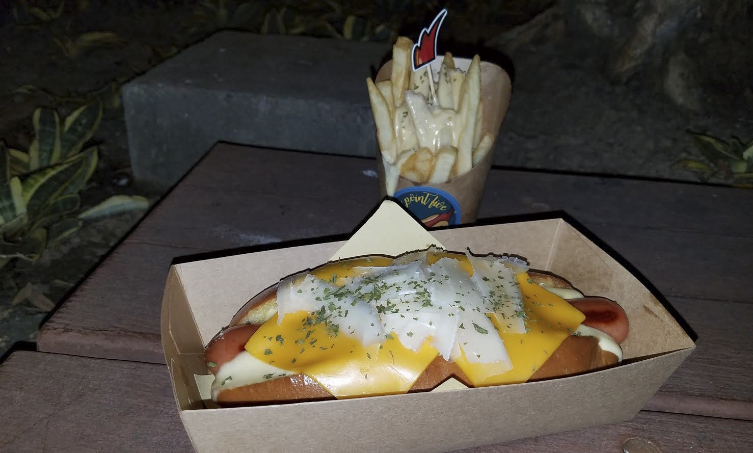 The triple cheese hot dog and fries with cheese sauce at Nine Point Five, Sai Kung, Hong Kong. Photo: SCMP