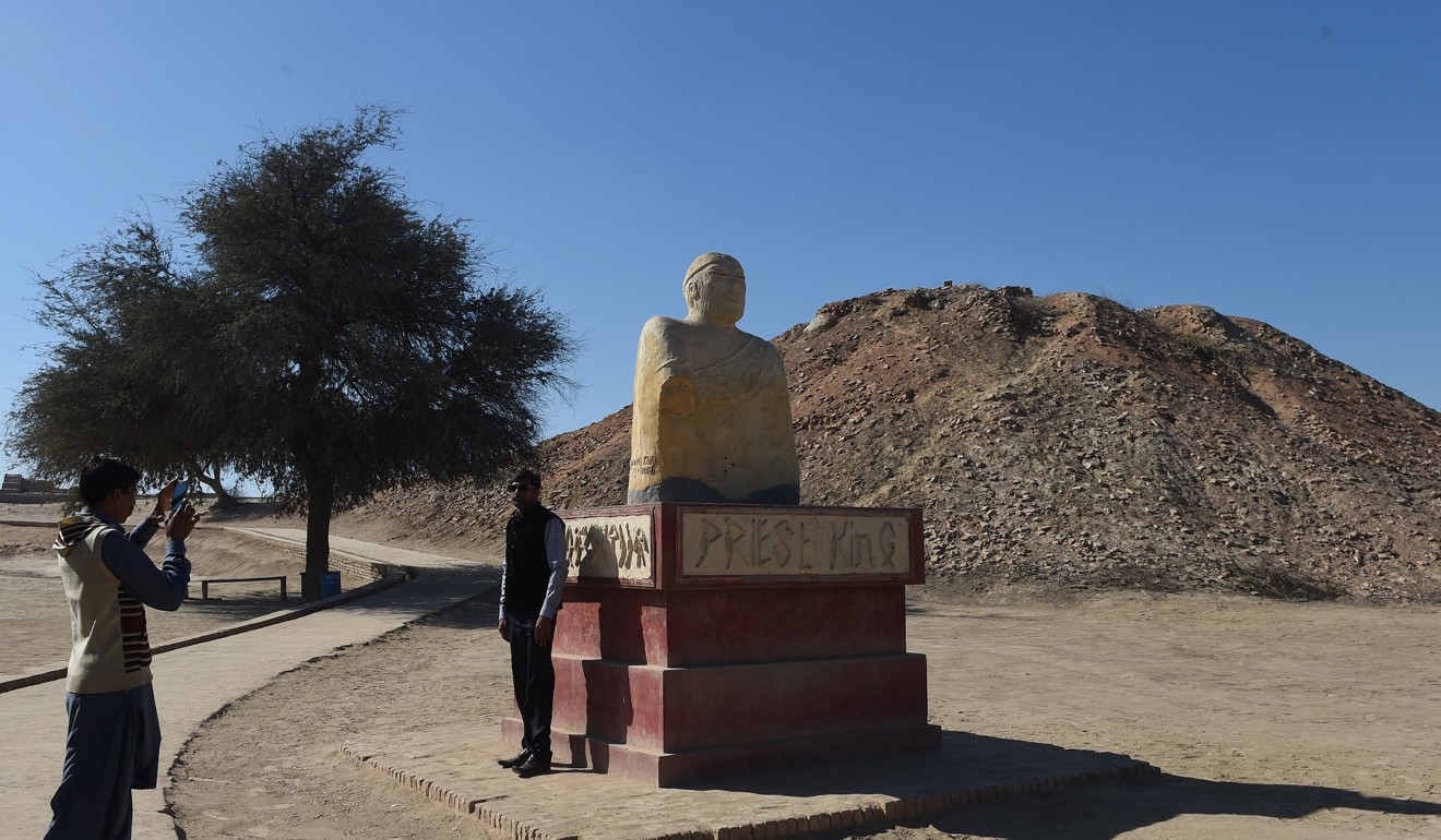 A replica of a statue discovered at an archeological site of Mohenjo Daro, 425km north of the Pakistani city of Karachi. Archaeologists believe the ruins could unlock the secrets of the Indus Valley people, who flourished around 3,000BC in what is now India and Pakistan before mysteriously disappearing. Photo: AFP