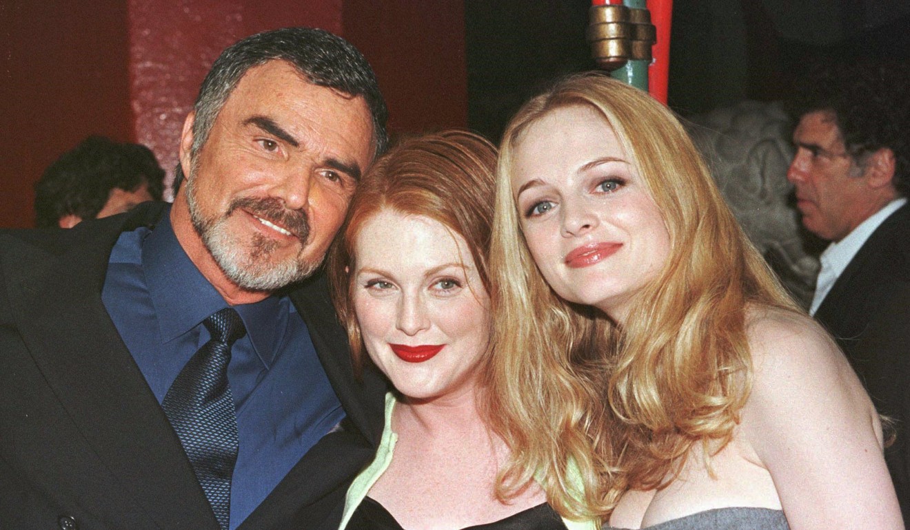 Boogie Nights co-stars Burt Reynolds, Julianne Moore and Heather Graham attend the film's premiere in Hollywood at Mann's Chinese Theatre, on October 15, 1997. Reynolds later said he never watched the movie. Photo: Reuters