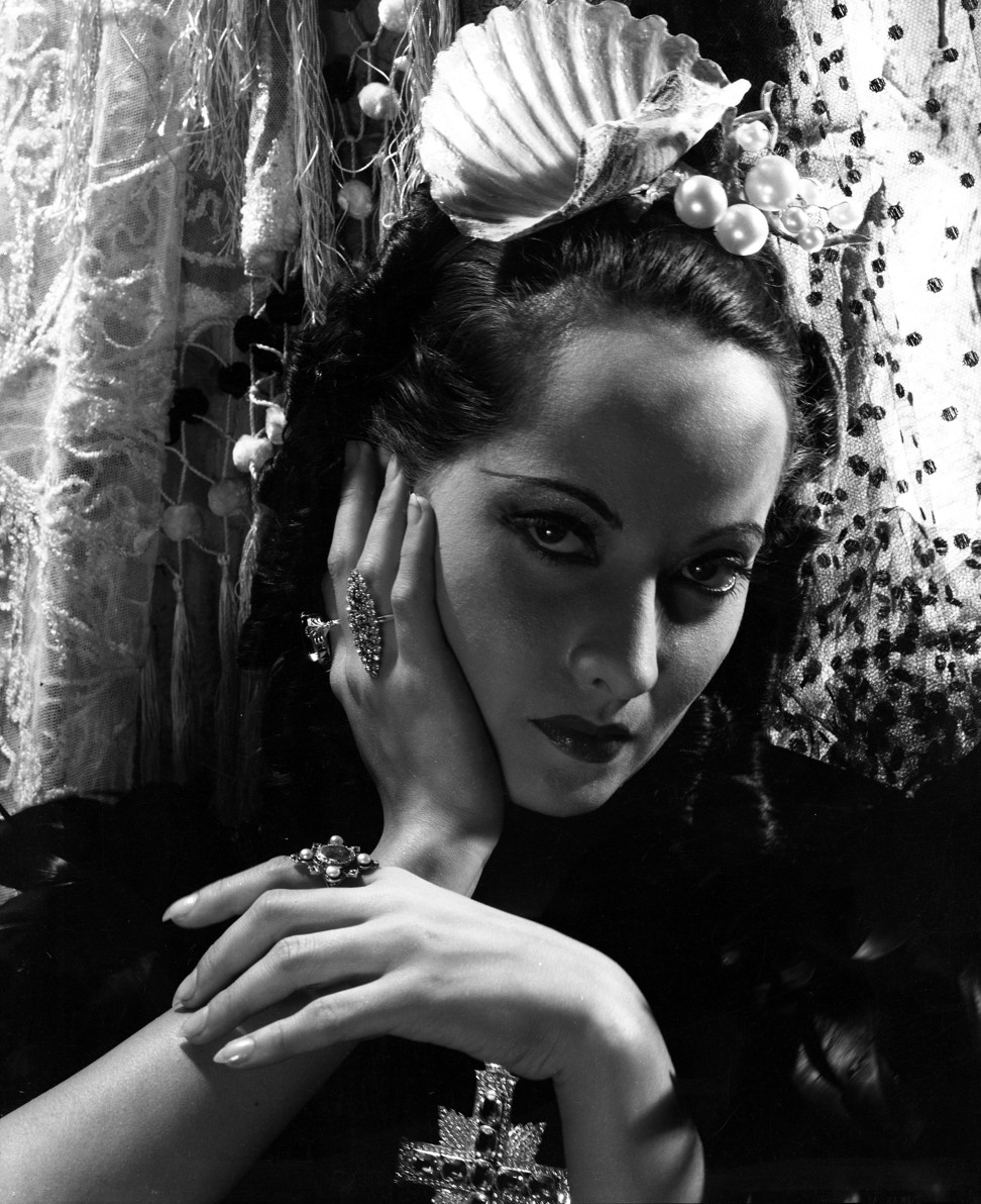 Actress Merle Oberon, in 1934, wearing a pearl headdress designed by Cecil Beaton. Photo: Cecil Beaton