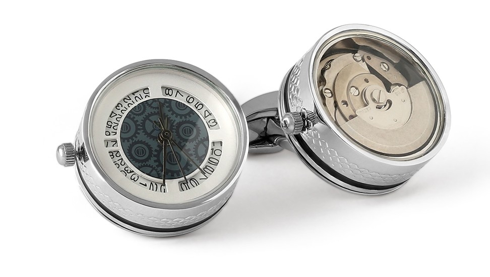Tateossian. The Perrelet automatic watch cufflinks have an elegant design and feature a Japanese movement. One side of the cufflinks is a fully functional watch with three hands and the other side features the exposed movement of this watch with 21-point jewels, HK$3,910