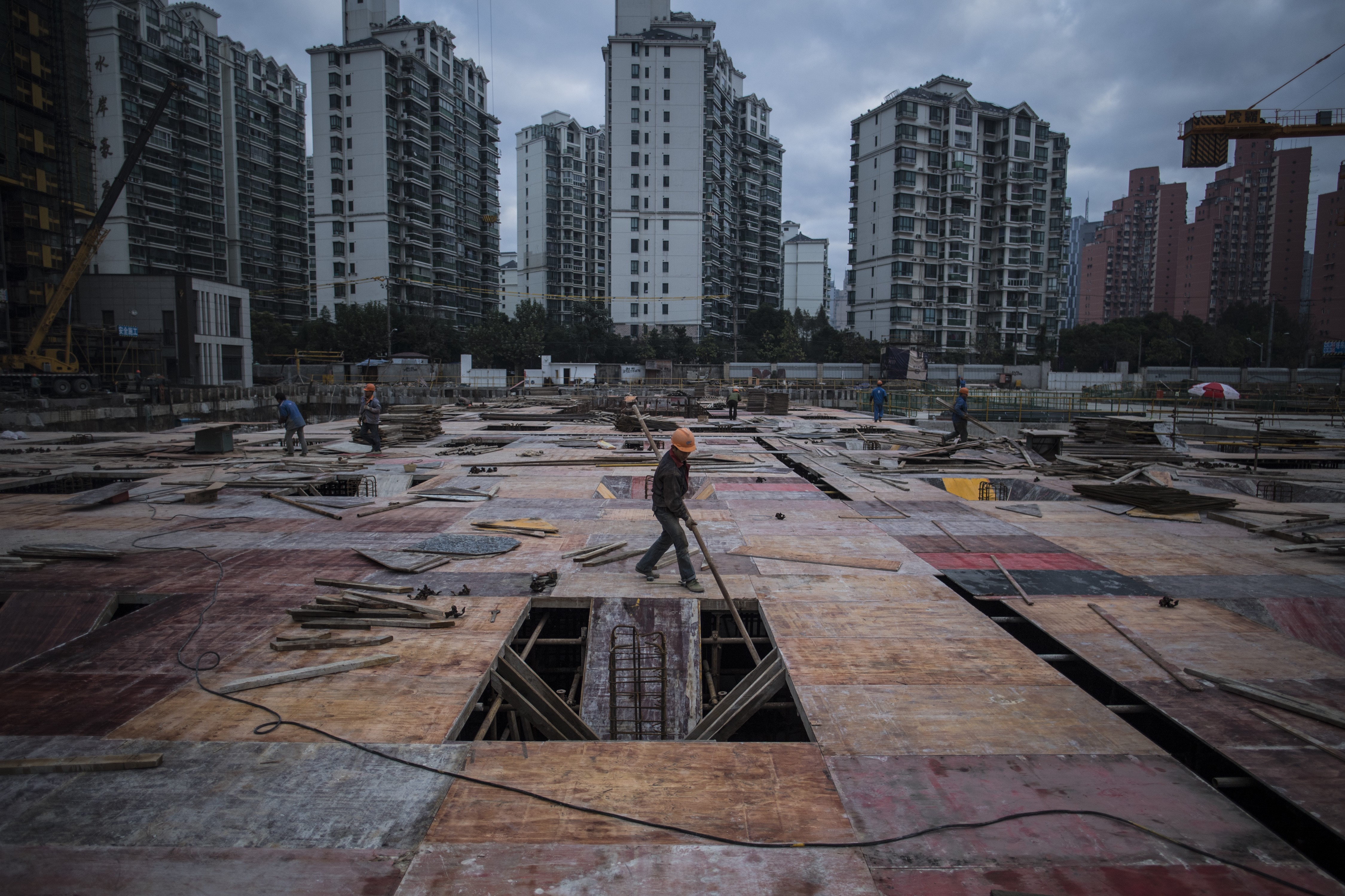 Forget the trade war. Chinese companies, including real estate firms, face other challenges like government regulation of borrowing. Photo: AFP