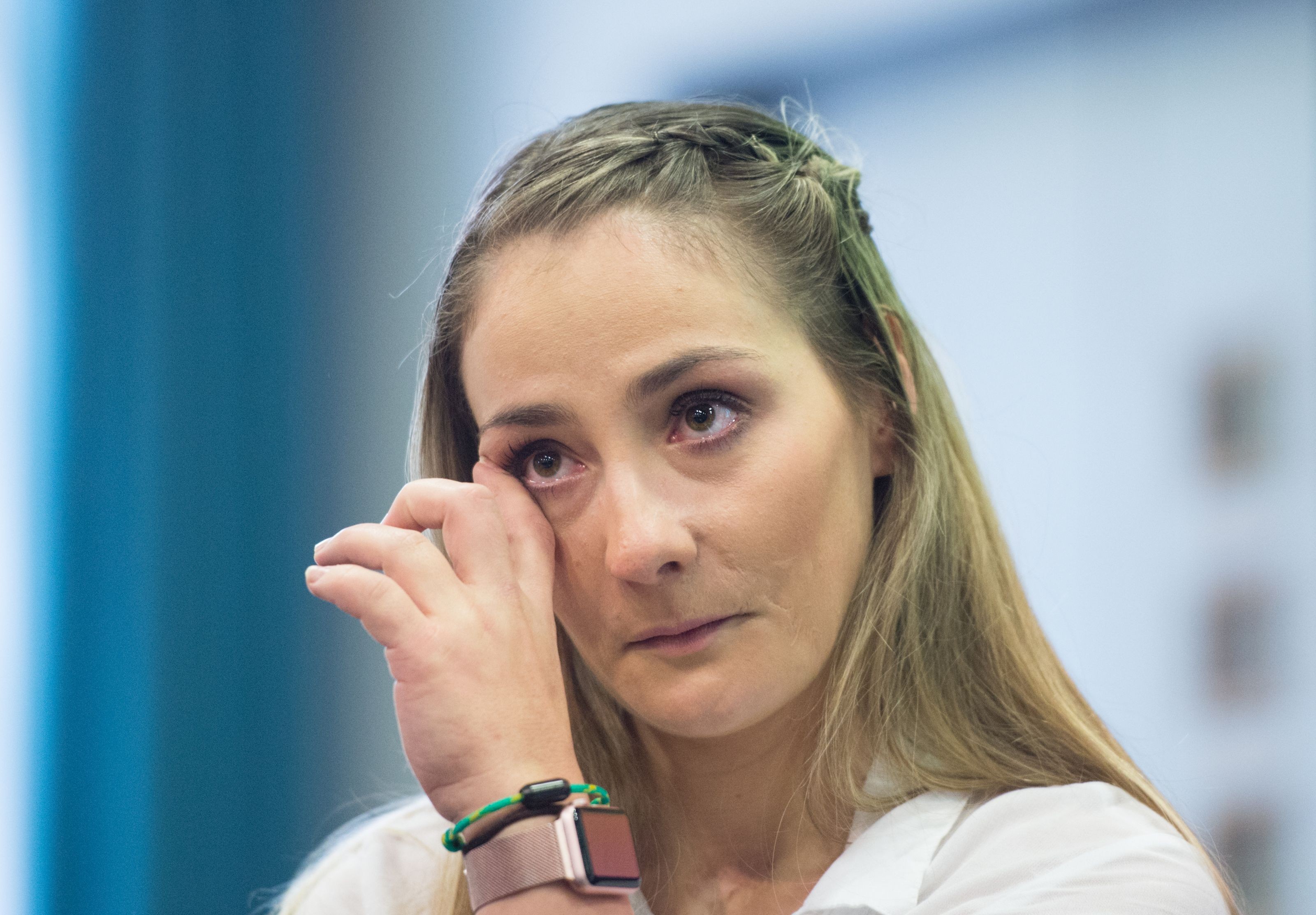 Kristina Vogel sheds a tear as she meets the press in a Berlin hospital. Photo: AFP