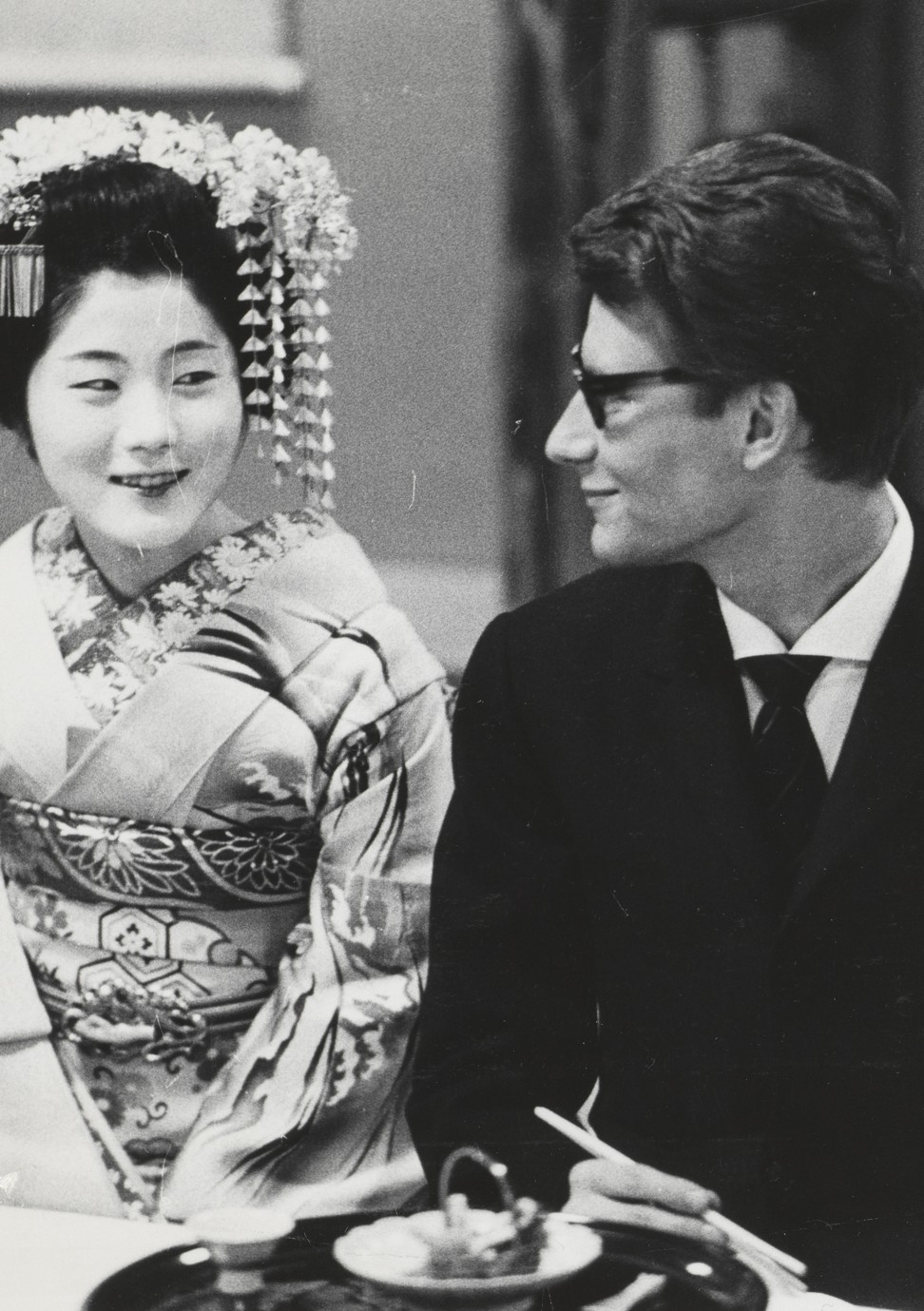 Saint Laurent with a geisha in Kyoto, April 1963. Photo: Courtesy of Musee Yves Saint Laurent