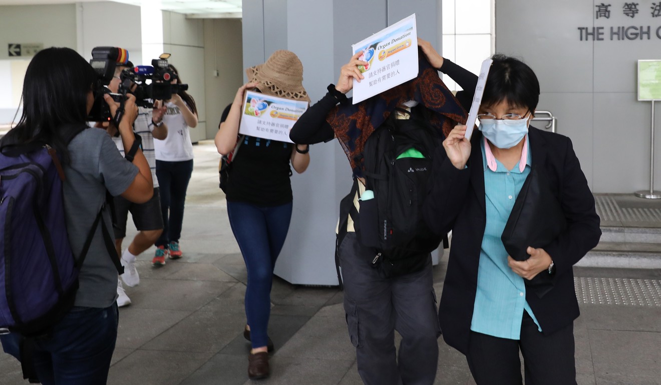 Relatives of Khaw Kim Sun leave the High Court. Photo: Sam Tsang