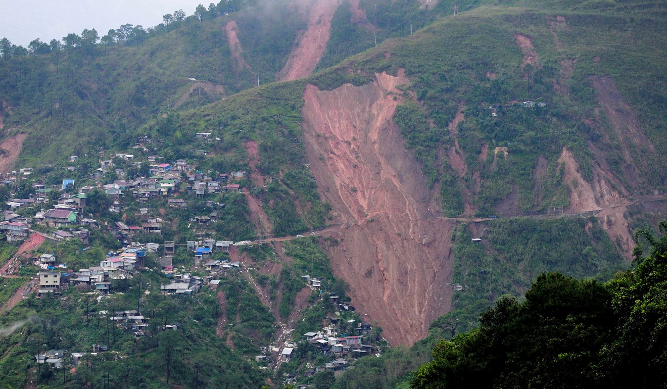 The landslide that buried people at a mining camp in Itogon. Photo: Reuters