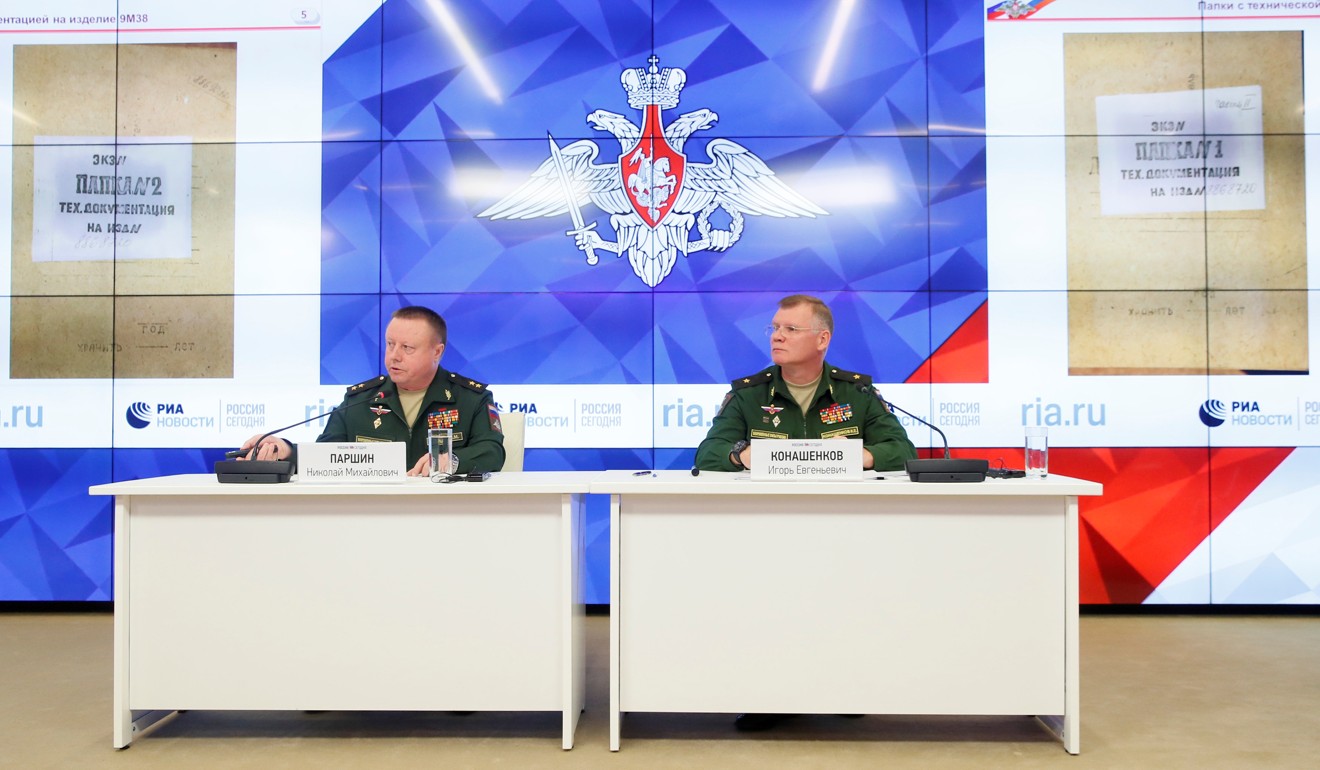 Chief of the directorate of media service and information of the Russian Defence Ministry, Major-General Igor Konashenkov (right) and head of the Main Missile and Artillery Directorate of the Russian Defence Ministry Lieutenant-General Nikolai Parshin hold a news conference in Moscow on Monday. Photo: Reuters