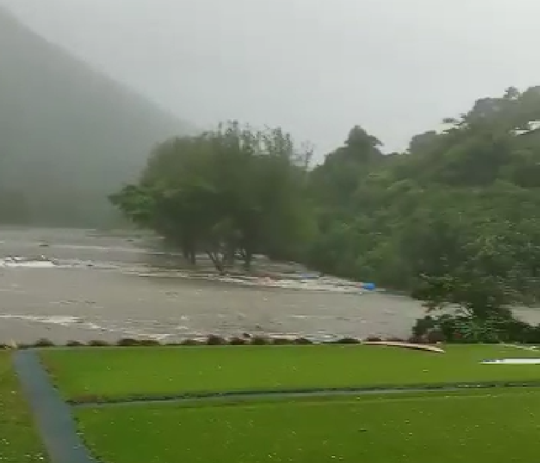 A still from a video showing the lower nine holes of Shek O Country Club’s golf course submerged under water. Photo: Handout