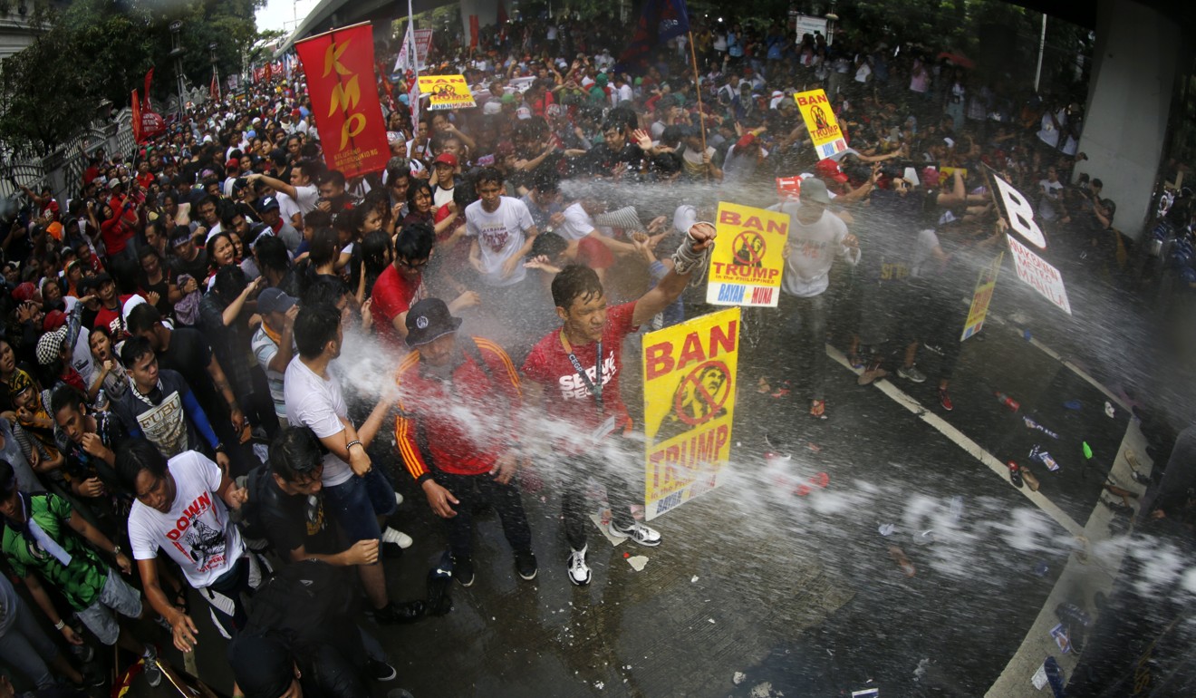 Filipino activists clash with riot police during a protest at the Asean summit in Manila last year. Photo: EPA