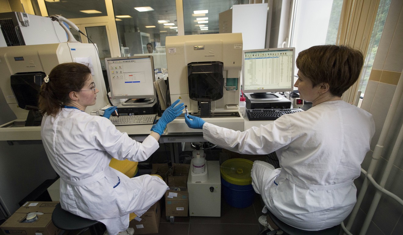 Employees work in Russia’s national drug-testing laboratory in Moscow. Photo: AP
