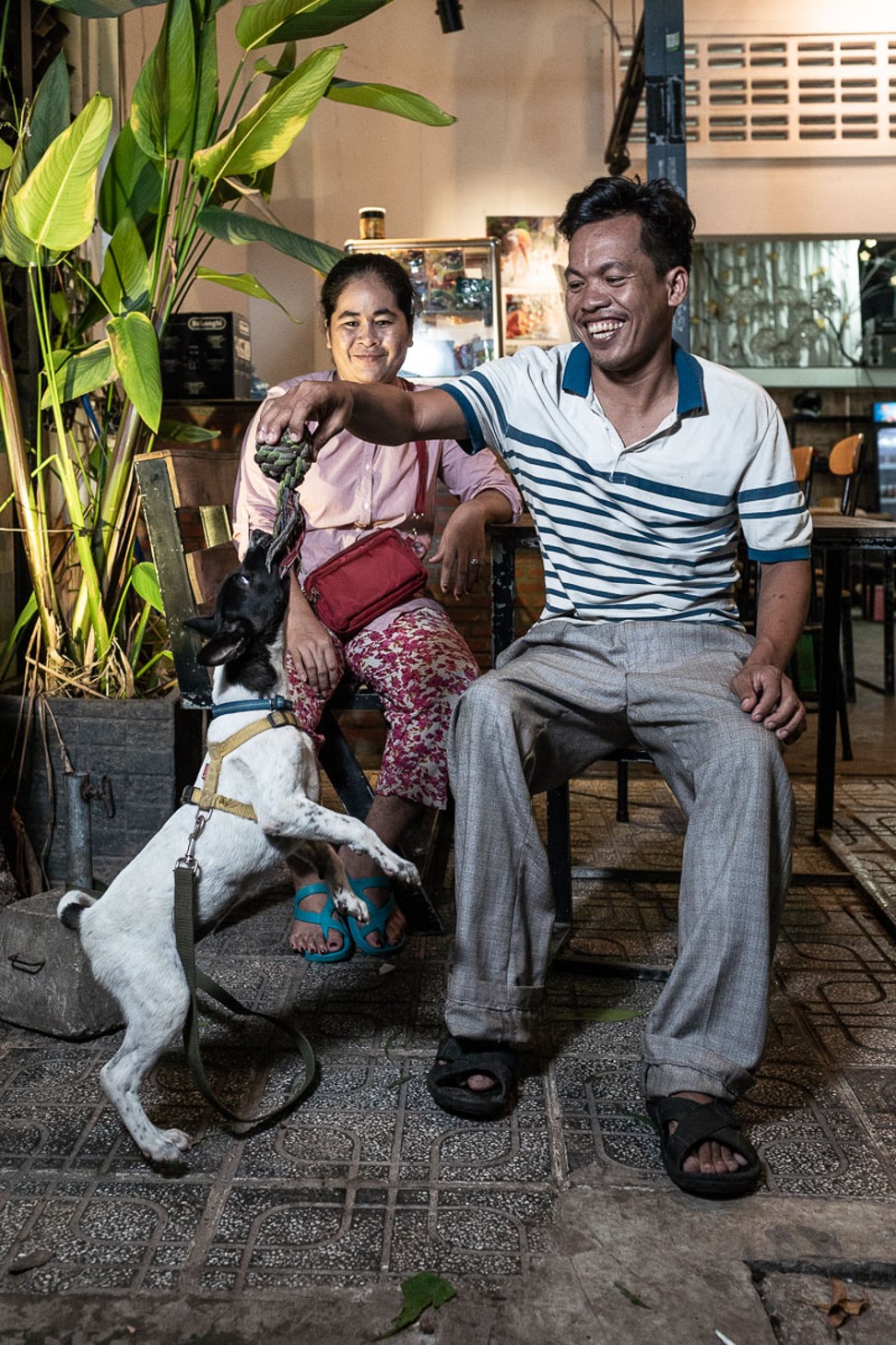Chom Mong and his wife, Syna, who previously ran a dog meat restaurant but are now running a vegan restaurant, Sabay Vegilicious, in Phnom Penh, Cambodia. Photo: Enric Catala