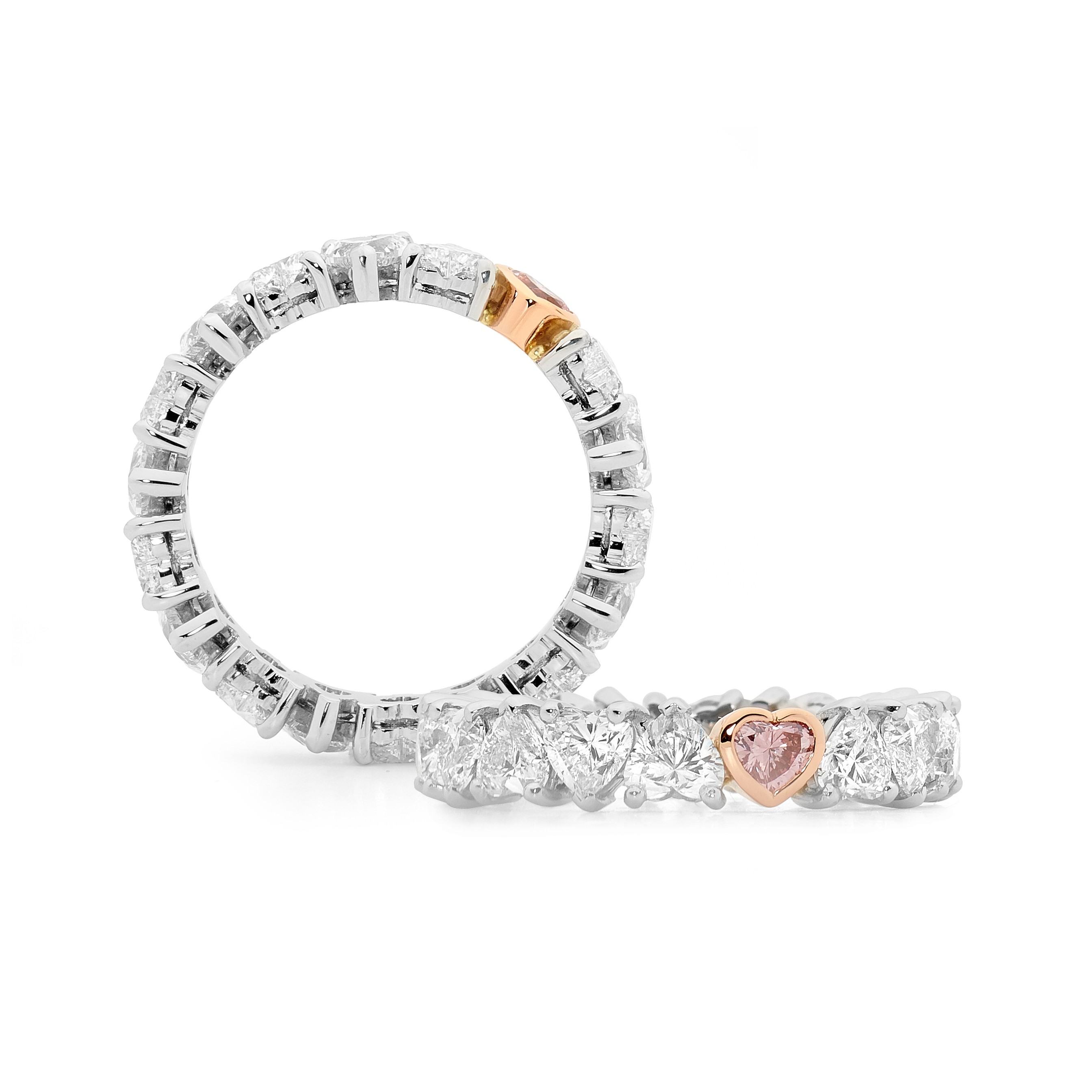 Rohan Jewellery Hearts ring with a heart shape Argyle pink diamond set among a band of white diamond hearts. Photo: Conrad VANECEK