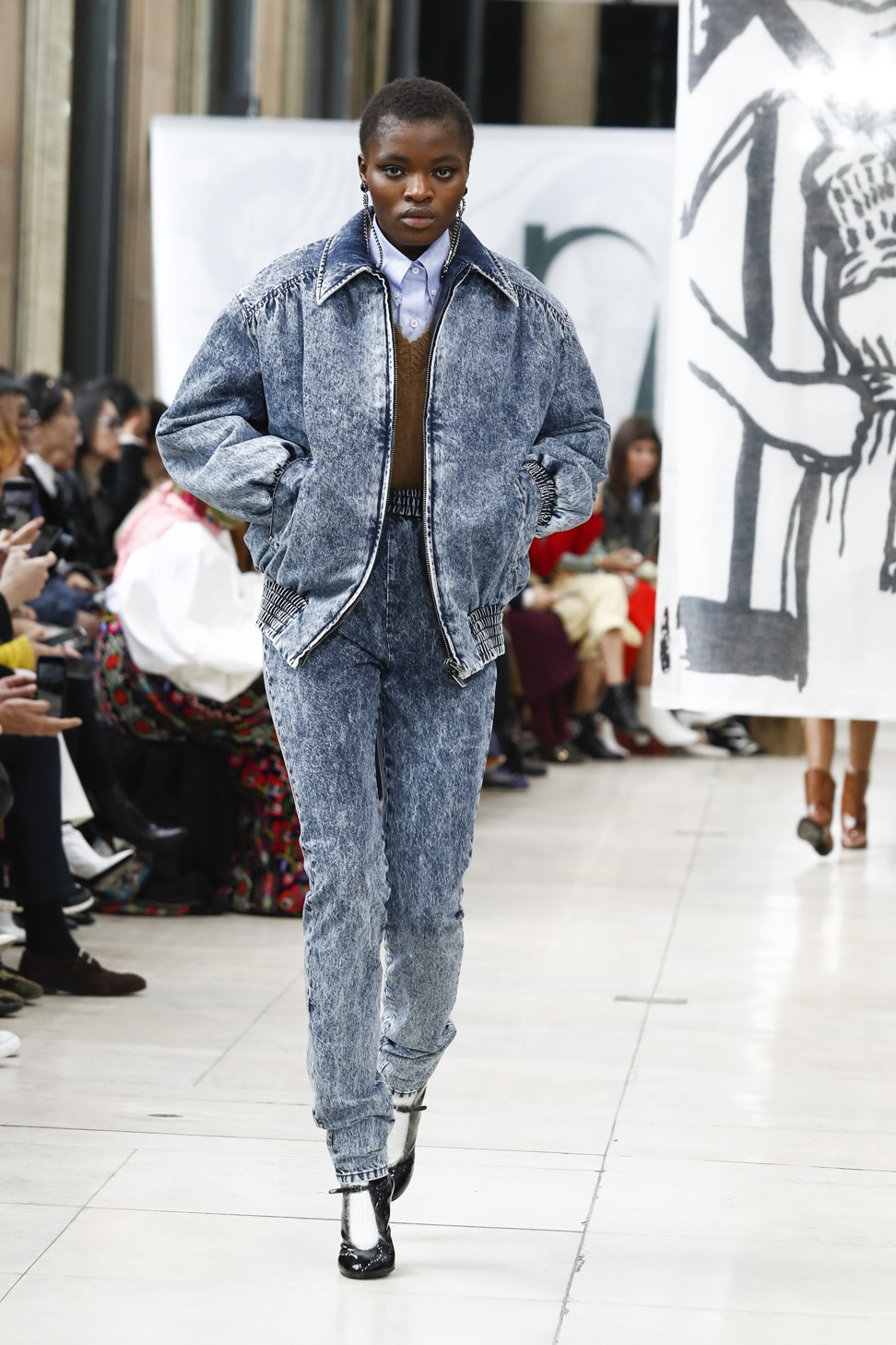 A double-denim look from Miu Miu’s autumn/winter collection.
