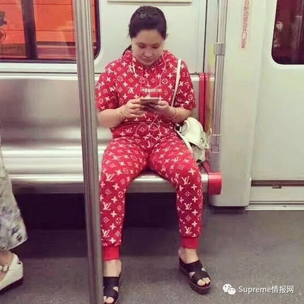 A photo trending online showing a woman in a fake Supreme and Louis Vuitton tracksuit.