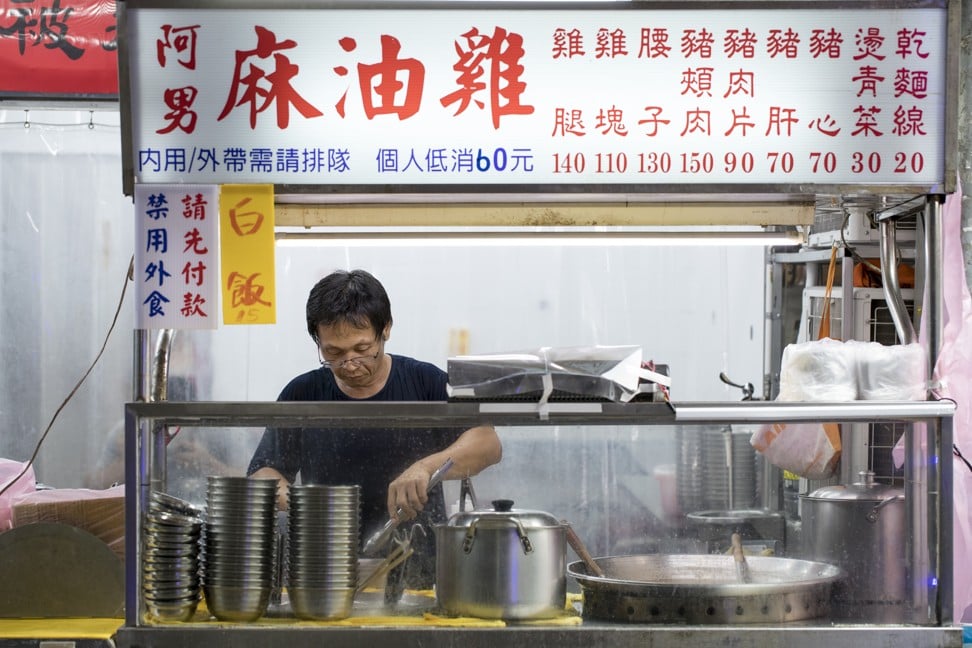 Chef Lin Guo Nan at work at A Nan Sesame Chicken, in Taipei.