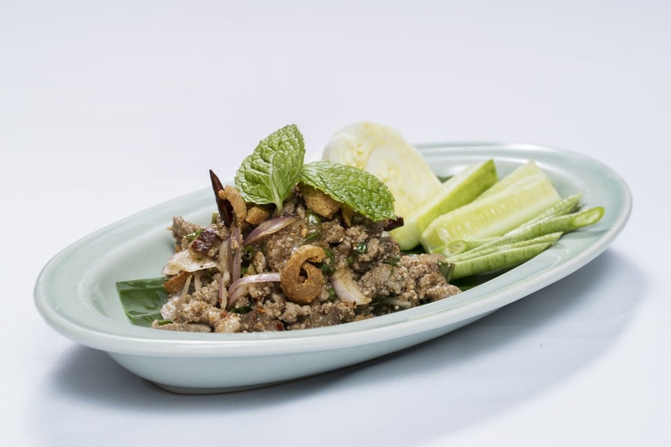 Sugar cane smoked duck larb with organic red sticky rice is one of the signature dishes served by the Thai restaurant Soul Food Mahanakorn.