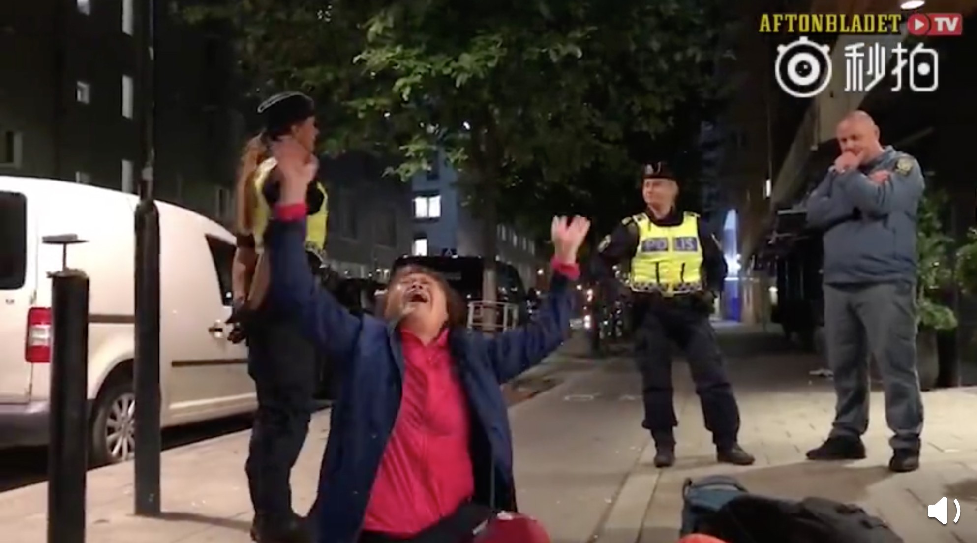 A Chinese tourist cries out after his family were removed from a Swedish hostel. The incident has escalated into a diplomatic incident after the Chinese embassy in Stockholm issued a complaint to the local authorities. Photo: Handout