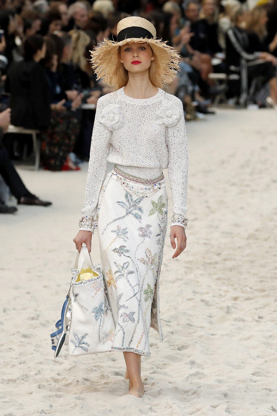 Karl Lagerfeld lifts spirits with youthful Chanel 'beach party' at Paris Fashion  Week