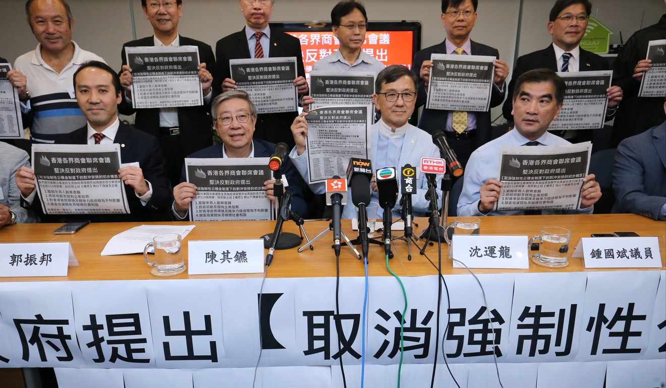 Business groups oppose the government’s proposal to scrap the MPF offset mechanism at a press conference in May this year. Photo: Dickson Lee
