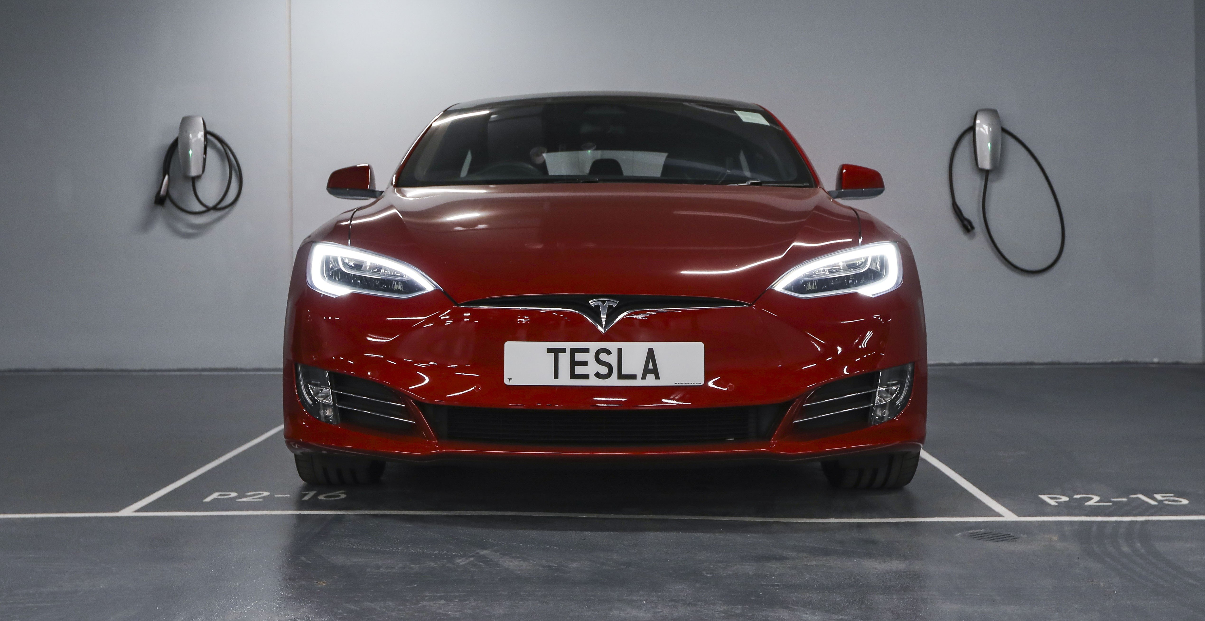 Will Tesla Lose Its Cool In Hong Kong Axa Triples Insurance