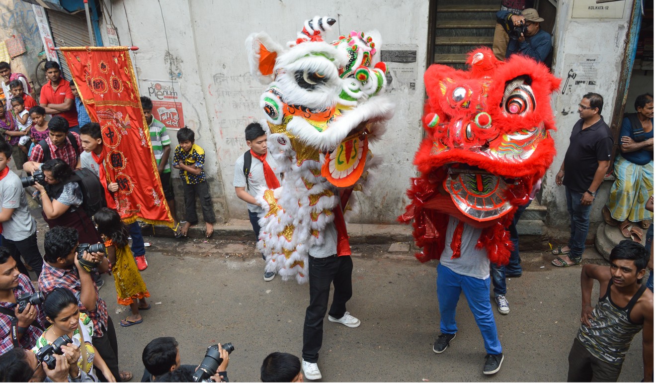 Members of Kolkata’s Chinese community celebrate Lunar New Year in Chinatown. Photo: Tanmoy Bhaduri/Pacific Press/Alamy