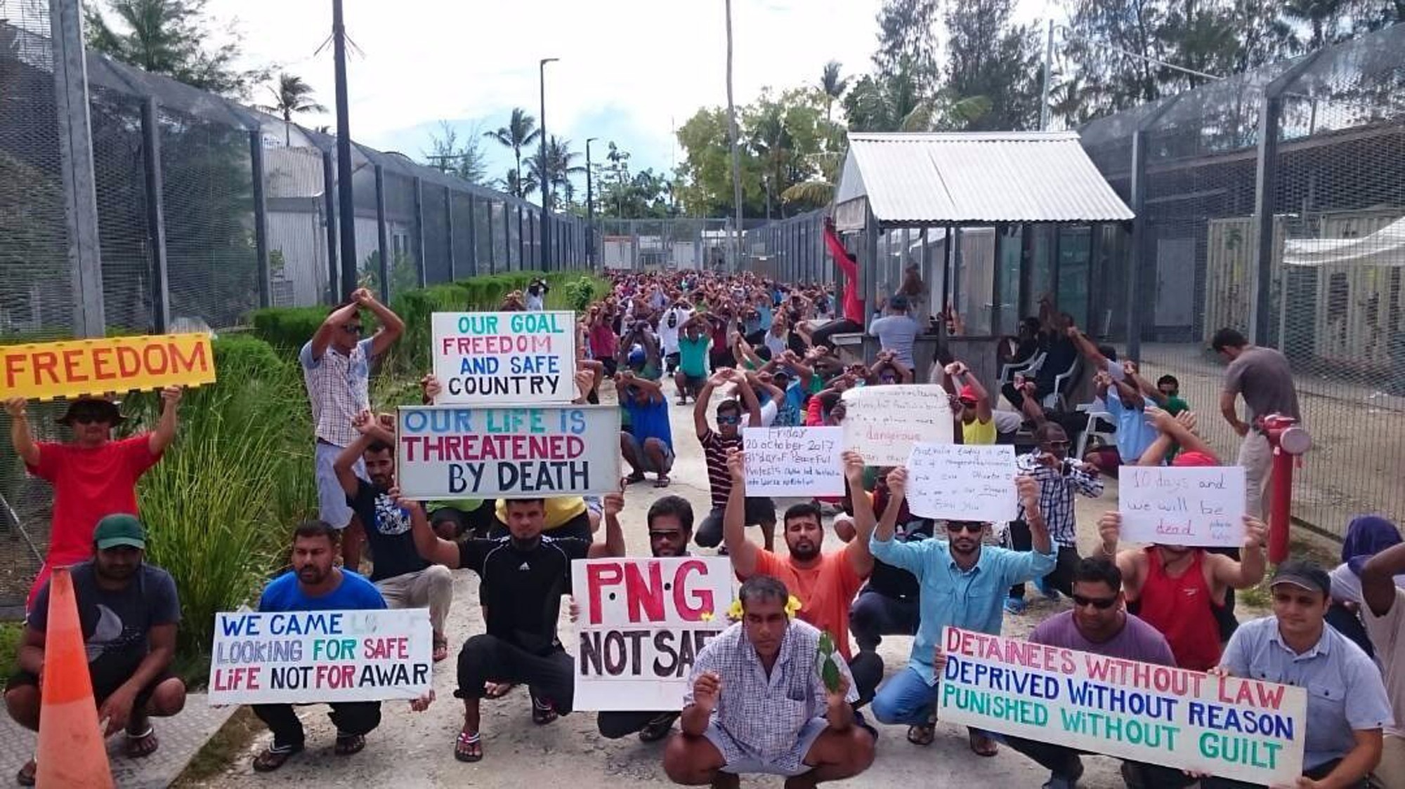 Refugees and asylum seekers protest at Australia’s now-closed Manus Island immigration detention centre in Papua New Guinea. Photo: AP