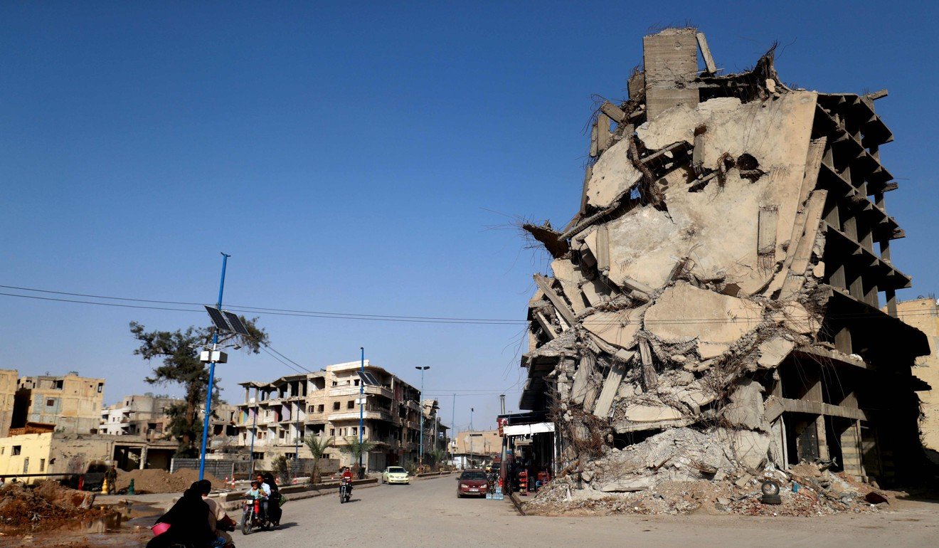 A partially destroyed building in Raqa, Syria, on October 18. Photo: AFP