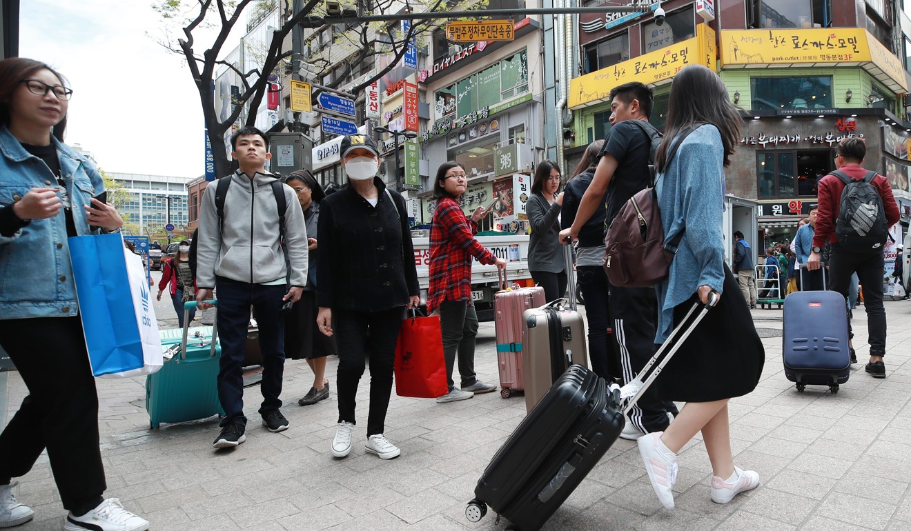 Chinese tourist numbers to Seoul plummeted after Beijing banned travel to the South Korean capital. Photo: EPA