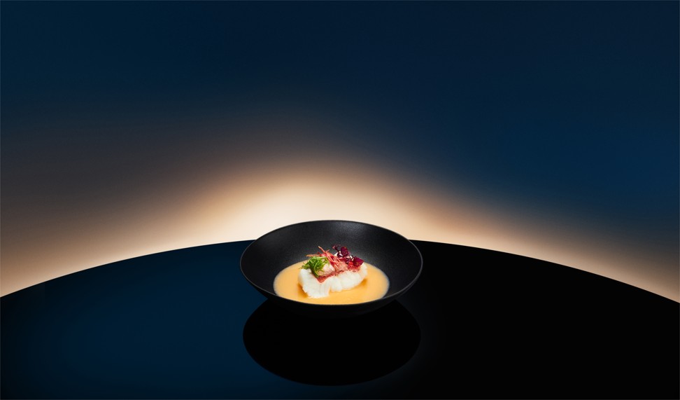 Grouper fillet with bird’s nest in lobster bisque by chef Paul Lau